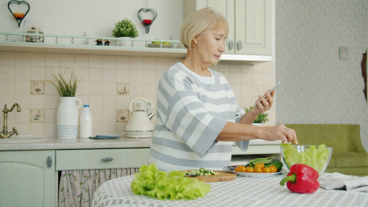 how to gut healthy with colorful vegetables and fermented foods like sauerkraut and kimchi on a wooden table