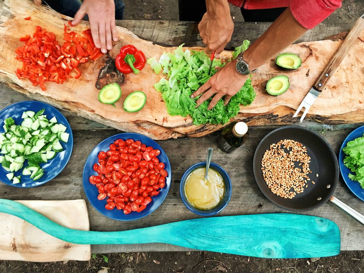 A vibrant bowl of brown rice, grilled salmon, avocado slices, and steamed broccoli—eating well 30 minute meals made simple